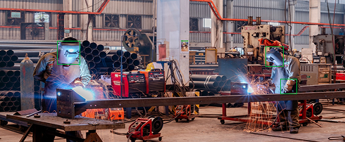 AI monitoring welding operations in a manufacturing plant.