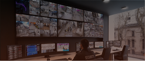 AI-powered security and surveillance system monitoring multiple CCTV camera feeds in a security operations center.